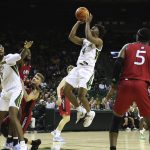 
              Baylor guard LJ Cryer (4) attempts a shot against Incarnate Word in the first half of an NCAA college basketball game Friday, Nov. 12, 2021, in Waco, Texas. (AP Photo/Jerry Larson)
            