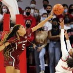 
              South Carolina's Victaria Saxton (5) blocks the shot of North Carolina State's Jakia Brown-Turner (11) during the first half of an NCAA college basketball game Tuesday, Nov. 9, 2021, in Raleigh, N.C. (AP Photo/Karl B. DeBlaker)
            