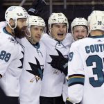 
              San Jose Sharks right wing Timo Meier (28) celebrates his goal with teammates during the second period of an NHL hockey game against the New Jersey Devils, Tuesday, Nov. 30, 2021, in Newark, N.J. (AP Photo/Bill Kostroun)
            