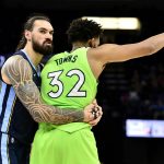 
              Memphis Grizzlies center Steven Adams, left, reacts after fouling Minnesota Timberwolves center Karl-Anthony Towns (32) in the first half of an NBA basketball game Monday, Nov. 8, 2021, in Memphis, Tenn. (AP Photo/Brandon Dill)
            