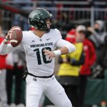 
              Michigan State quarterback Payton Thorne drops back to pass against Ohio State during the first half of an NCAA college football game Saturday, Nov. 20, 2021, in Columbus, Ohio. (AP Photo/Jay LaPrete)
            
