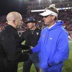 
              Vanderbilt head coach Clark Lea and Mississippi head coach Lane Kiffin shake hands after an NCAA college football game in Oxford, Miss., Saturday, Nov. 20, 2021. Mississippi won 31-17. (AP Photo/Thomas Graning)
            