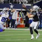 
              Dallas Cowboys cornerback Jourdan Lewis (26) defends as Las Vegas Raiders wide receiver Hunter Renfrow (13) catches a pass for a long gain in the second half of an NFL football game in Arlington, Texas, Thursday, Nov. 25, 2021. (AP Photo/Michael Ainsworth)
            