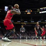 
              Toronto Raptors forward OG Anunoby prepares to shoot a 3-pointer against the Portland Trail Blazers during the first half of an NBA basketball game in Portland, Ore., Monday, Nov. 15, 2021. (AP Photo/Craig Mitchelldyer)
            