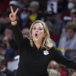 
              Clemson coach Amanda Butler signals to players during the first half of the team's NCAA college basketball game against South Carolina on Wednesday, Nov. 17, 2021, in Columbia, S.C. (AP Photo/Sean Rayford)
            