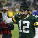 
              Green Bay Packers' Aaron Rodgers reacts as he walks off the field after an NFL football game against the Los Angeles Rams Sunday, Nov. 28, 2021, in Green Bay, Wis. The Packers won 36-28. (AP Photo/Matt Ludtke)
            