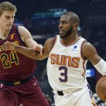 
              Phoenix Suns' Chris Paul (3) drives against Cleveland Cavaliers' Lauri Markkanen (24) during the first half of an NBA basketball game Wednesday, Nov. 24, 2021, in Cleveland. (AP Photo/Tony Dejak)
            