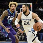 
              Memphis Grizzlies forward Dillon Brooks (24) drives against Charlotte Hornets guard Kelly Oubre Jr. (12) in the second half of an NBA basketball game Wednesday, Nov. 10, 2021, in Memphis, Tenn. (AP Photo/Brandon Dill)
            