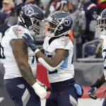 
              Tennessee Titans running back Dontrell Hilliard, center, is congratulated after his 68-yard touchdown run during the first half of an NFL football game against the New England Patriots, Sunday, Nov. 28, 2021, in Foxborough, Mass. (AP Photo/Mary Schwalm)
            