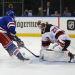 
              New York Rangers' Sammy Blais (91) is stopped by New Jersey Devils goalie Mackenzie Blackwood (29) during the second period of an NHL hockey game Sunday, Nov. 14, 2021, in New York. (AP Photo/John Munson)
            