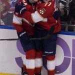 
              Florida Panthers right wing Owen Tippett (74) congratulates left wing Frank Vatrano (77) after Valtrano scored a goal during the second period at an NHL hockey game against the Minnesota Wild, Saturday, Nov. 20, 2021, in Sunrise, Fla. (AP Photo/Marta Lavandier)
            