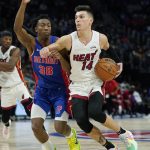 
              Miami Heat guard Tyler Herro (14) is defended by Detroit Pistons guard Saben Lee (38) during the second half of an NBA basketball game, Tuesday, Nov. 23, 2021, in Detroit. (AP Photo/Carlos Osorio)
            