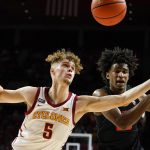 
              Iowa State forward Aljaz Kunc (5) fights for a rebound with Oregon State forward Glenn Taylor Jr., right, during the second half of an NCAA college basketball game, Friday, Nov. 12, 2021, in Ames, Iowa. Iowa State won 60-50. (AP Photo/Charlie Neibergall)
            