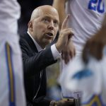 
              UCLA head coach Mick Cronin talks with players during a timeout in the second half of an NCAA college basketball game against the Long Beach State in Los Angeles, Monday, Nov. 15, 2021. (AP Photo/Ashley Landis)
            