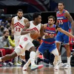 
              Toronto Raptors forward OG Anunoby, left, drives past Washington Wizards guard Raul Neto, of Brazil, in the first half of an NBA basketball game, Wednesday, Nov. 3, 2021, in Washington. (AP Photo/Patrick Semansky)
            