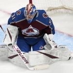 
              Colorado Avalanche goaltender Jonas Johansson makes a glove save against the Columbus Blue Jackets during the first period of an NHL hockey game Wednesday, Nov. 3, 2021, in Denver. (AP Photo/David Zalubowski)
            