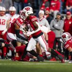 
              Wisconsin wide receiver Stephan Bracey (10) returns a kickoff for a touchdown against Nebraska during the first half of an NCAA college football game Saturday, Nov. 20, 2021, in Madison, Wis. (AP Photo/Andy Manis)
            