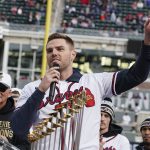 
              Atlanta Braves' Freddie Freeman speaks during a celebration at Truist Park, Friday, Nov. 5, 2021, in Atlanta. The Braves beat the Houston Astros 7-0 in Game 6 on Tuesday to win their first World Series MLB baseball title in 26 years. (AP Photo/John Bazemore)
            