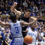 
              Army's Aaron Duhart, right, loses the ball as Duke's Jeremy Roach (3) defends during the first half of an NCAA college basketball game in Durham, N.C., Friday, Nov. 12, 2021. (AP Photo/Ben McKeown)
            