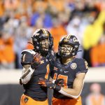 
              Oklahoma State wide receivers Tay Martin (1) and Bryson Green (19) react after Martin's touchdown catch is ruled incomplete during a NCAA football game between Oklahoma State and Oklahoma in Stillwater, Okla. on Saturday, Nov. 27, 2021.(Ian Maule/Tulsa World via AP)
            