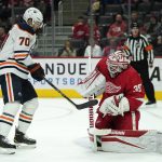 
              Detroit Red Wings goaltender Alex Nedeljkovic (39) stops a Edmonton Oilers center Colton Sceviour (70) shot in the first period of an NHL hockey game Tuesday, Nov. 9, 2021, in Detroit. (AP Photo/Paul Sancya)
            