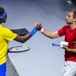 
              Sweden's Elias Ymer, left, shakes hands after beating Canada's Steven Diez during their Davis Cup tennis match in Madrid, Spain, Thursday, Nov. 25, 2021. (AP Photo/Manu Fernandez)
            