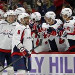 
              Washington Capitals' Alex Ovechkin (8) celebrates his goal along the bench during the second period of an NHL hockey game against the Carolina Hurricanes in Raleigh, N.C., Sunday, Nov. 28, 2021. (AP Photo/Karl B DeBlaker)
            