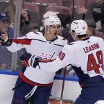 
              Washington Capitals left wing Beck Malenstyn, left, celebrates his goal with right wing Brett Leason (49) during the first period of an NHL hockey game against the Florida Panthers, Tuesday, Nov. 30, 2021, in Sunrise, Fla. (AP Photo/Wilfredo Lee)
            