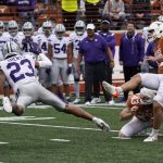 
              Texas place kicker Cameron Dicker (17) watches his field goal attempt past Kansas State defensive back Julius Brents (23) during the second half of an NCAA college football game in Austin, Texas, Friday, Nov. 26, 2021. (AP Photo/Chuck Burton)
            
