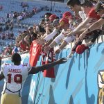 
              San Francisco 49ers wide receiver Deebo Samuel (19) high five fans after defeating the Jacksonville Jaguars in an NFL football game, Sunday, Nov. 21, 2021, in Jacksonville, Fla. (AP Photo/Phelan M. Ebenhack)
            