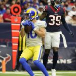 
              Los Angeles Rams wide receiver Cooper Kupp (10) catches a pass for a touchdown in front of Houston Texans cornerback Terrance Mitchell (39) during the second half of an NFL football game, Sunday, Oct. 31, 2021, in Houston. (AP Photo/Eric Christian Smith)
            