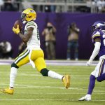 
              Green Bay Packers wide receiver Marquez Valdes-Scantling, left, catches a 75-yard touchdown pass ahead of Minnesota Vikings free safety Xavier Woods, right, during the second half of an NFL football game, Sunday, Nov. 21, 2021, in Minneapolis. (AP Photo/Bruce Kluckhohn)
            