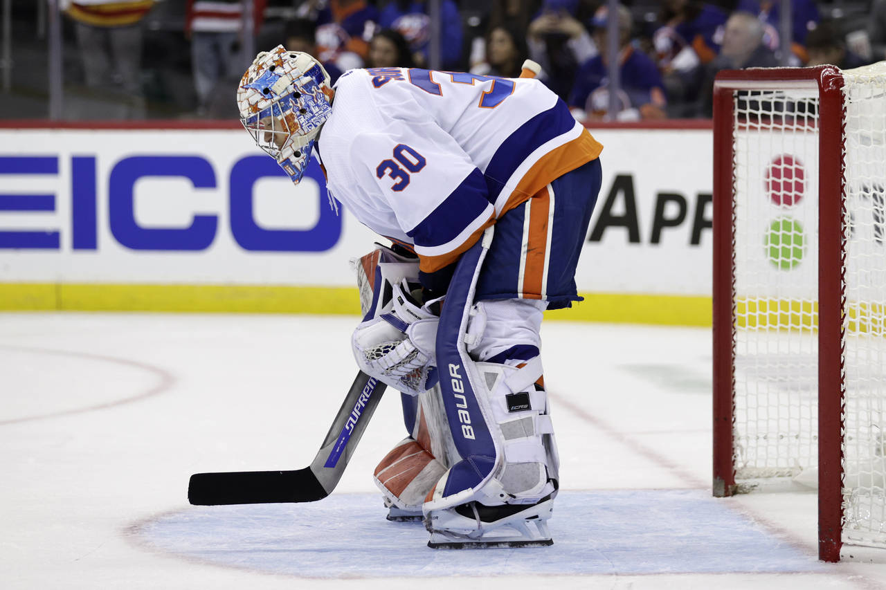 New York Islanders goaltender Ilya Sorokin reacts against the New Jersey Devils during the third pe...