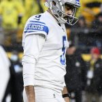 
              Detroit Lions kicker Ryan Santoso walks off the field after missing a 48-yard field goal-attempt during overtime of an NFL football game in Pittsburgh, Sunday, Nov. 14, 2021. (AP Photo/Don Wright)
            