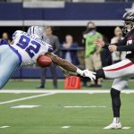 
              Dallas Cowboys defensive end Dorance Armstrong (92) blocks a punt by Atlanta Falcons punter Dustin Colquitt in the first half of an NFL football game in Arlington, Texas, Sunday, Nov. 14, 2021. The Cowboys recovered the ball in the end zone for a touchdown. (AP Photo/Michael Ainsworth)
            