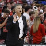 
              Ohio State head coach Chris Holtmann instructs his team against Duke during the first half of an NCAA college basketball game Tuesday, Nov. 30, 2021, in Columbus, Ohio. (AP Photo/Jay LaPrete)
            