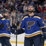 
              St. Louis Blues' Robert Bortuzzo, right, is congratulated by Jake Walman after scoring during the second period of an NHL hockey game against the Edmonton Oilers Sunday, Nov. 14, 2021, in St. Louis. (AP Photo/Jeff Roberson)
            