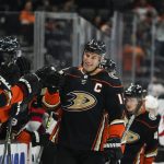 
              Anaheim Ducks' Ryan Getzlaf, center, celebrates his goal during the fist period of an NHL hockey game against the New Jersey Devils Tuesday, Nov. 2, 2021, in Anaheim, Calif. (AP Photo/Jae C. Hong)
            