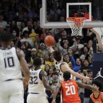 
              Marquette's Tyler Kolek shoots the go-ahead basket during the second half of the team's NCAA college basketball game against Illinois on Monday, Nov. 15, 2021, in Milwaukee. (AP Photo/Aaron Gash)
            