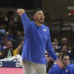 
              Pittsburgh coach Jeff Capel reacts during the first half of an NCAA college basketball game against West Virginia in Morgantown, W.Va., Friday, Nov. 12, 2021. (AP Photo/Kathleen Batten)
            