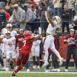 
              Louisiana-Monroe wide receiver Jared Sparks (8) can't grab a pass while being defended by Louisiana-Lafayette linebacker Ferrod Gardner (7) in the first half of an NCAA college football game in Lafayette, La., Saturday, Nov. 27, 2021. (AP Photo/Matthew Hinton)
            