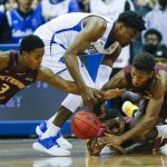 
              Seton Hall's Alexis Yetna (10) fights for the ball against Bethune-Cookman's Damani McEntire, bottom right, Dylan Robertson, bottom center, and Marcus Garrett (3) during the first half of an NCAA college basketball game, Sunday, Nov. 28, 2021, in Newark, N.J. (AP Photo/Eduardo Munoz Alvarez)
            
