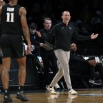 
              Xavier coach Travis Steele reacts to a call during the first half of the team's NCAA college basketball game against Iowa State in the NIT Season Tip-Off tournament Wednesday, Nov. 24, 2021, in New York. (AP Photo/Adam Hunger)
            
