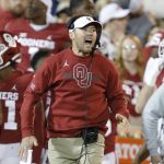 
              Oklahoma head coach Lincoln Riley yells to his team before a play during the first half of an NCAA college football game against TCU, Saturday, Oct. 16, 2021, in Norman, Okla. (AP Photo/Alonzo Adams)
            