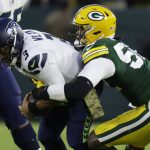 
              Green Bay Packers' Rashan Gary sacks Seattle Seahawks' Russell Wilson during the first half of an NFL football game Sunday, Nov. 14, 2021, in Green Bay, Wis. (AP Photo/Matt Ludtke)
            