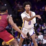 
              LSU guard Eric Gaines (2) passes the ball away from Louisiana-Monroe guard Reginald Gee (5) during an NCAA college basketball game Tuesday, Nov. 9, 2021, at the LSU PMAC in Baton Rouge, La. (Hilary Scheinuk/The Advocate via AP)
            