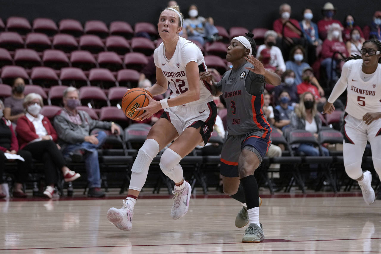 Stanford guard Lexie Hull (12) dribbles past Morgan State guard Ja'Niah Henson (3) during the first...