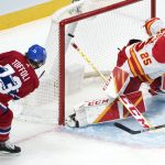 
              Montreal Canadiens' Tyler Toffoli shoots high on Calgary Flames goaltender Jacob Markstrom during the first period of an NHL hockey game Thursday, Nov. 11, 2021, in Montreal. (Paul Chiasson/The Canadian Press via AP)
            