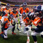 
              The Denver Broncos defense celebrates cornerback Pat Surtain II's, center, interception during the second half of an NFL football game against the Los Angeles Chargers, Sunday, Nov. 28, 2021, in Denver. (AP Photo/Jack Dempsey)
            
