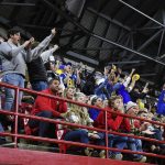 
              South Dakota State fans cheer over less-enthusiastic South Dakota fans after South Dakota misses a field goal during an NCAA college football game, Saturday, Nov. 13, 2021, at the DakotaDome in Vermillion, S.D. (Erin Woodiel/The Argus Leader via AP)
            